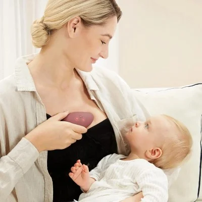 MOMCOZY MASSEUR DE LACTATION CHAUFFANT 2-EN-1